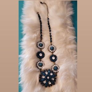 Blue and crystal necklace with brass accent!